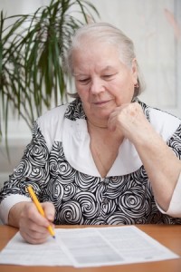 0714_GOP_woman-signing-docs